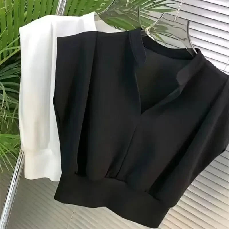 Camisetas sin mangas con cuello en V y cintura estética