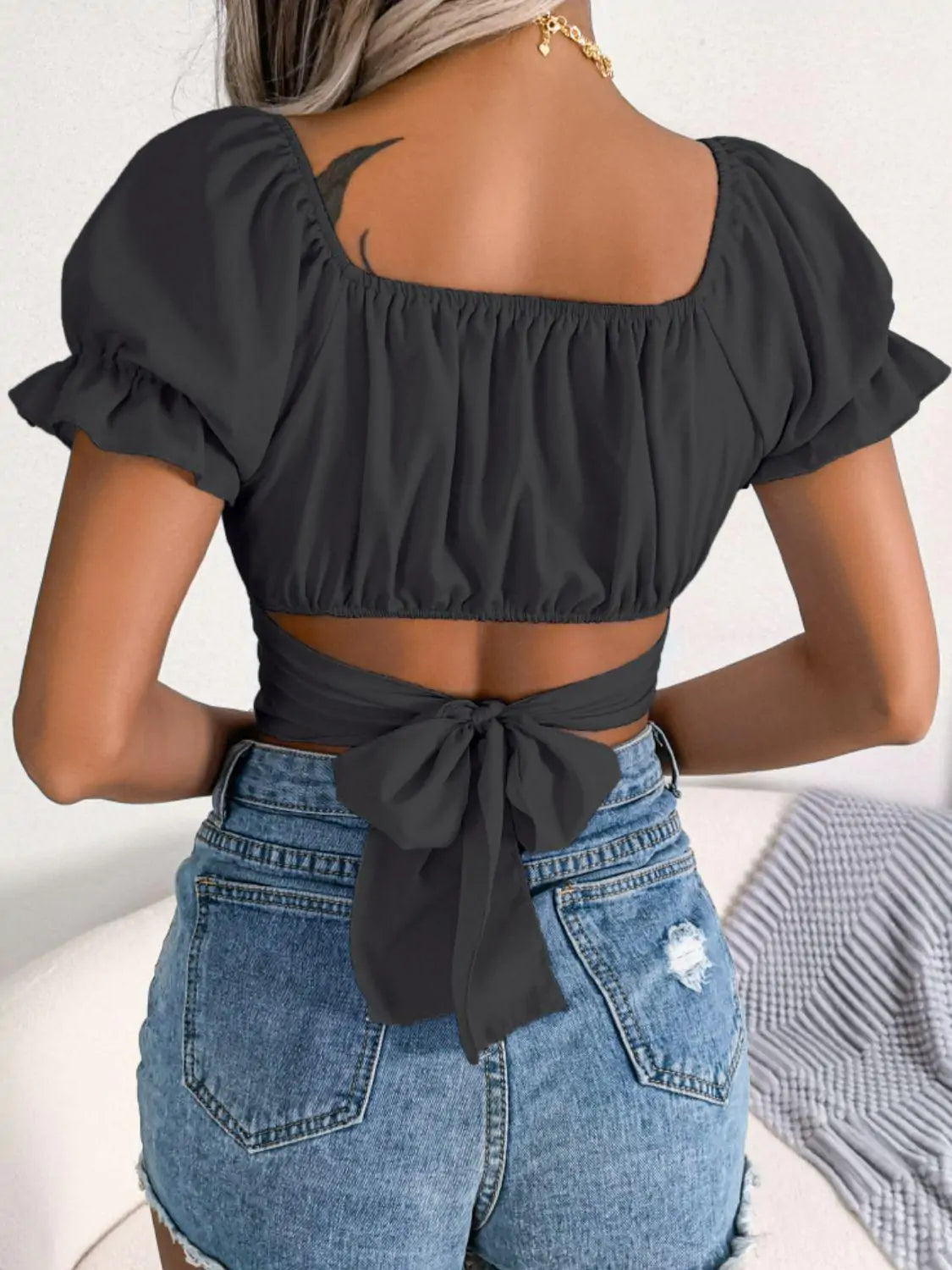 Crop top with crossed ruffle sleeves and square neck