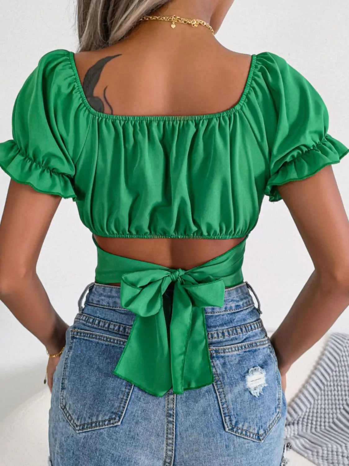 Crop top with crossed ruffle sleeves and square neck